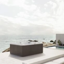 Jacuzzi® J245™ / J245IP™ - 7 Person Hot Tub 27 Jacuzzi® J245™ / J245IP™ - 7 Person Hot Tub -Outdoor Living Hot Tubs JHT J245 Lifestyle Silverwood Cropped squae